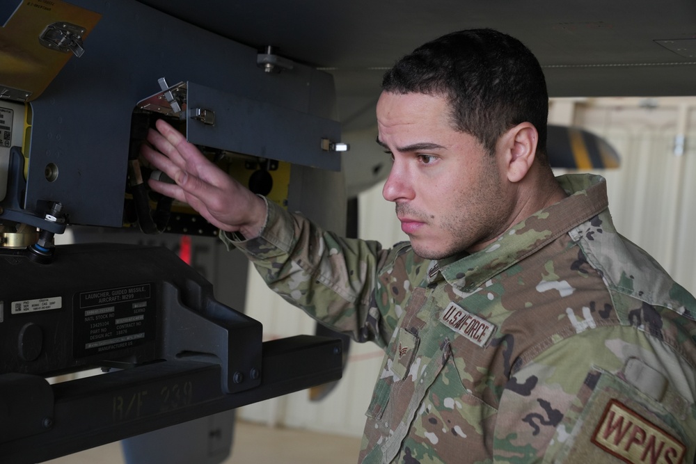 Precision Training in Action: Crew Equips MQ-9 Reaper with Mock Munitions