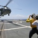 Sailors Aboard The USS Howard Conduct Flight Quarters in the Philippine Sea