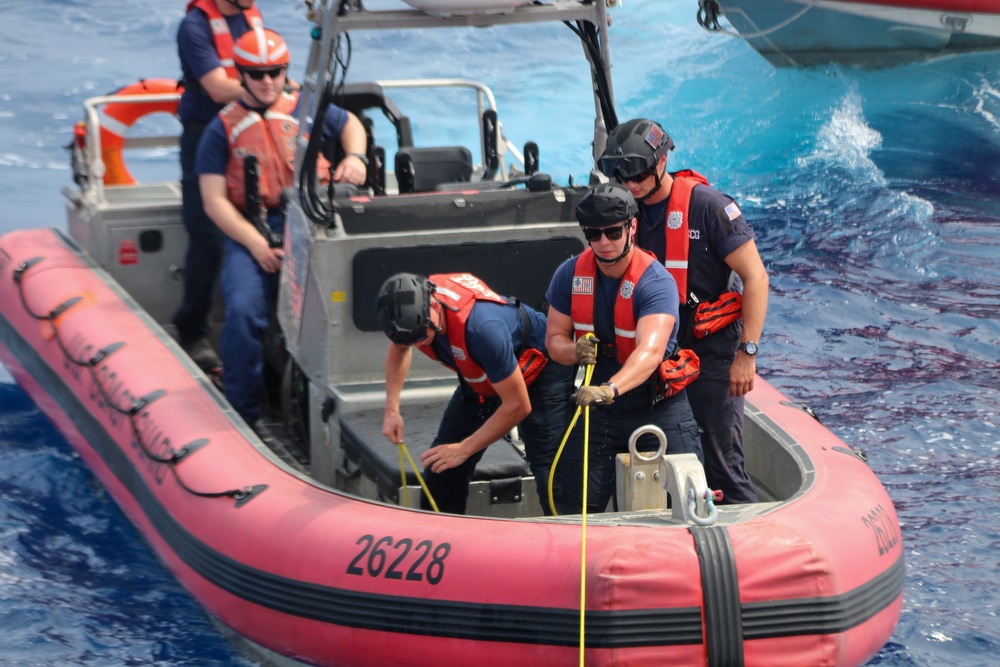 US Coast Guard Cutter Hamilton conducts small boat evolutions with Coast Guard Cutter Munro