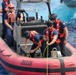 US Coast Guard Cutter Hamilton conducts small boat evolutions with Coast Guard Cutter Munro