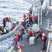 USS Curtis Wilbur (DDG 54) Rescues Two Men at Sea