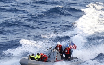 USS Curtis Wilbur (DDG 54) Rescues Two Men at Sea