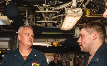Commander, Carrier Strike Group 9 visits USS John S. McCain