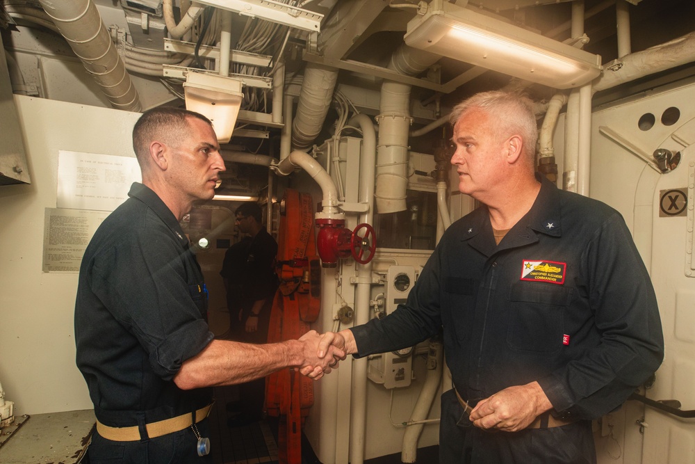 Commander, Carrier Strike Group 9 visits USS John S. McCain