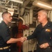 Commander, Carrier Strike Group 9 visits USS John S. McCain