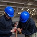 USS Ronald Reagan (CVN 76) Sailors conduct daily maintenance