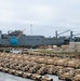 DoD, contracted personnel load hundreds of U.S. Army equipment aboard USNS Charlton