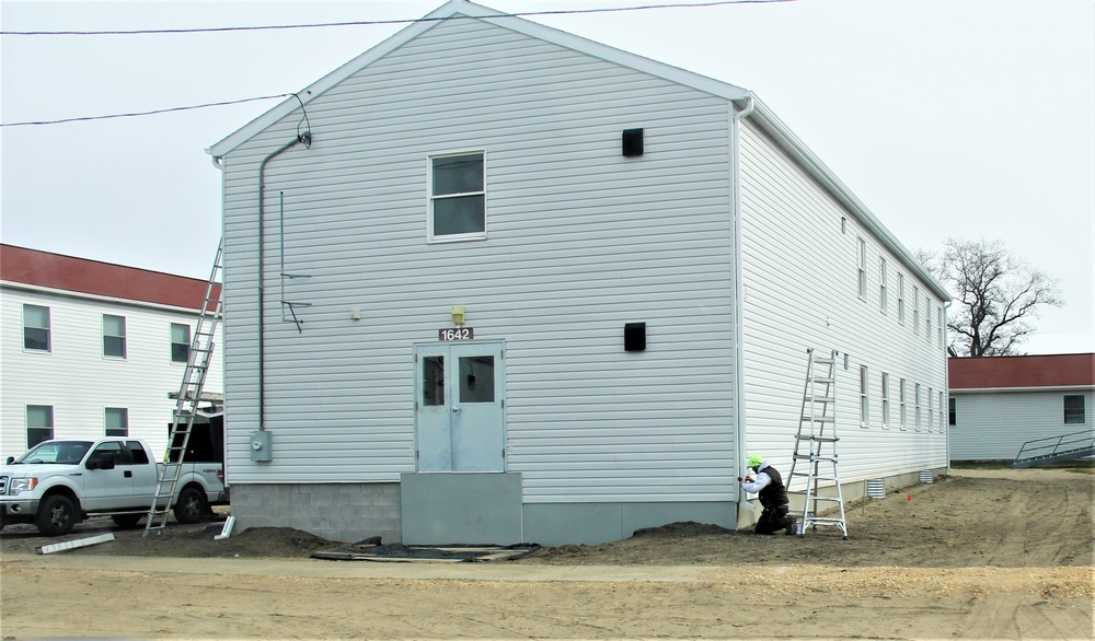 Reset of World War II-era barracks moved in 2023 continues; work nearly complete
