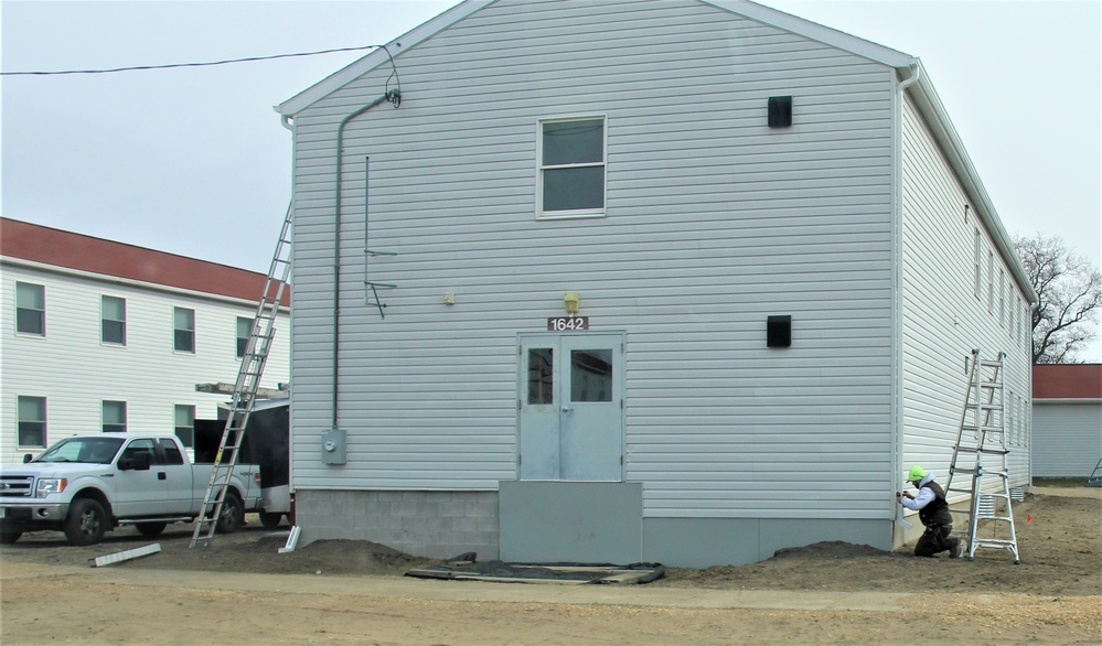 Reset of World War II-era barracks moved in 2023 continues; work nearly complete