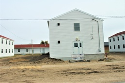 Reset of World War II-era barracks moved in 2023 continues; work nearly complete