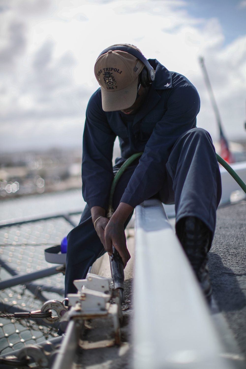 USS Tripoli Sailors Perform Flight Deck Maintenance