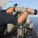 Sailors aboard the USS Howard conduct a counter unmanned aerial surveillance exercise in the Philippine Sea