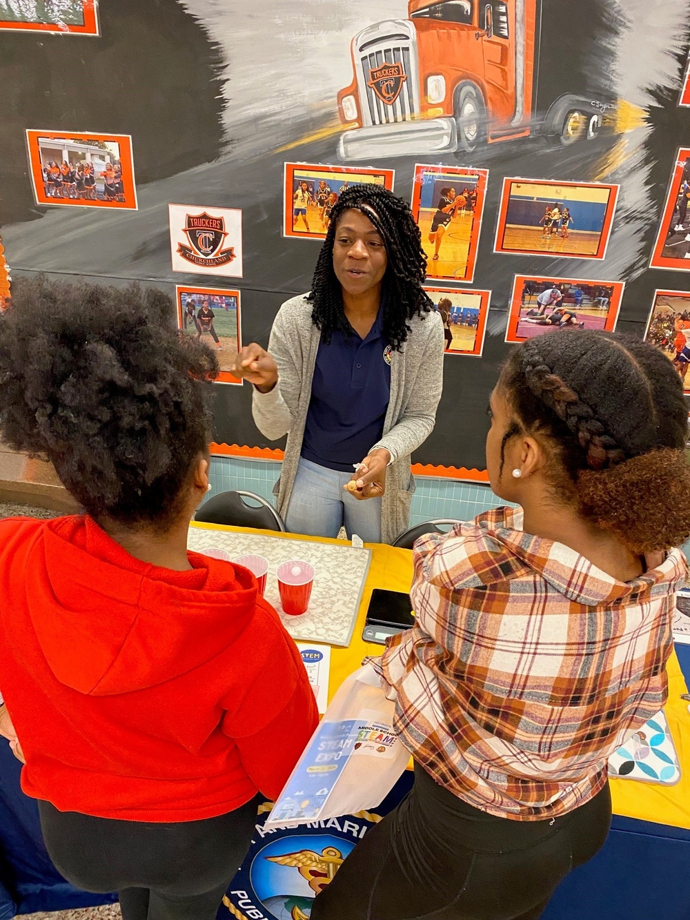 Charting a Course for Public Health: Navy and Marine Corps Force Health Protection Command Volunteers Lead the Way at Portsmouth Middle School STEAM Expo
