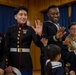 Graduation: Volunteers from Marine Corps Air Station Iwakuni hand out graduation certificates