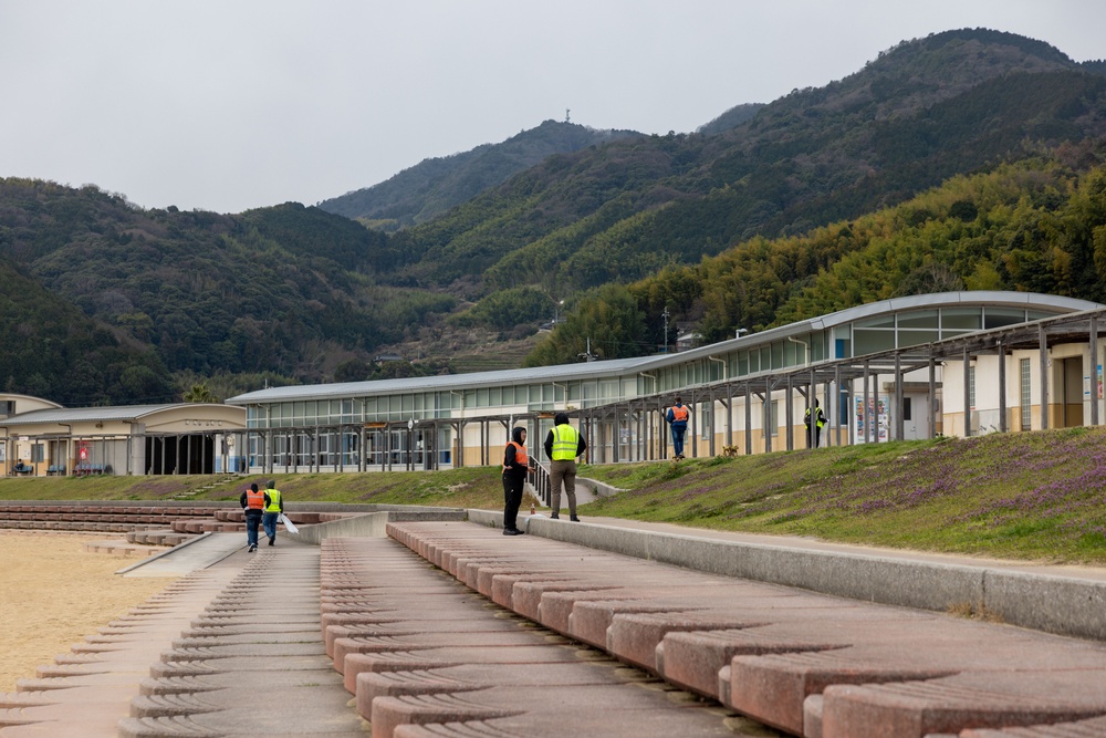 Marines and Sailors from MCAS Iwakuni participate in a beach cleanup