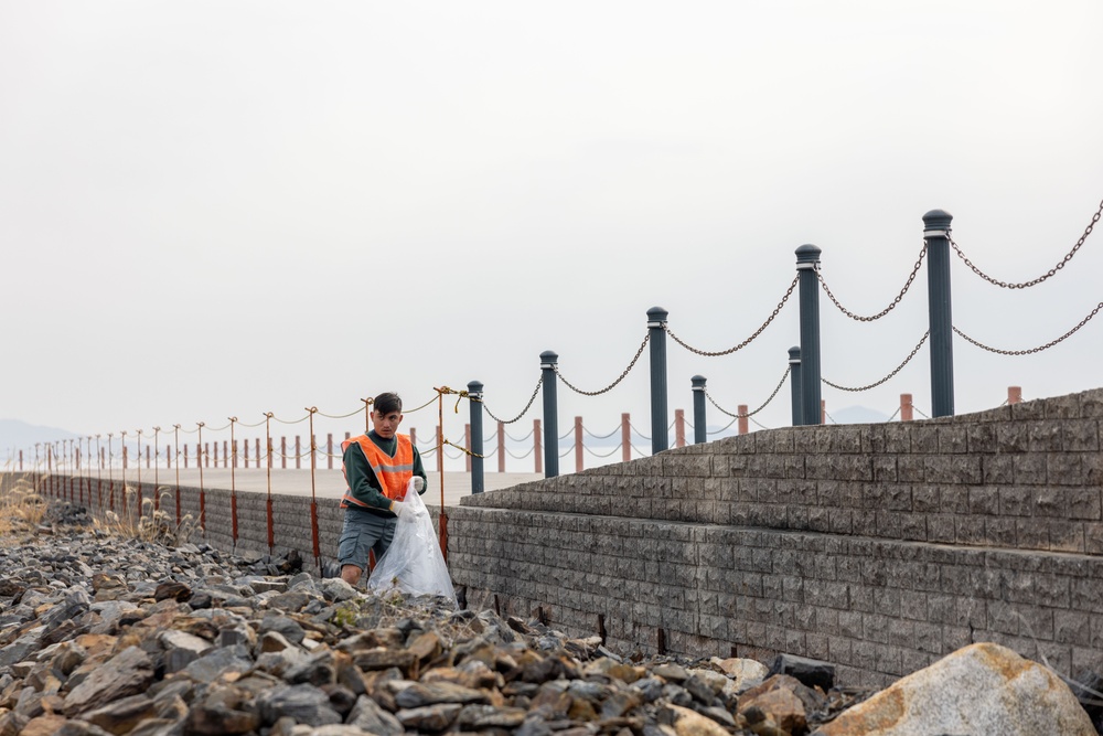 Marines and Sailors from MCAS Iwakuni participate in a beach cleanup