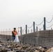 Marines and Sailors from MCAS Iwakuni participate in a beach cleanup