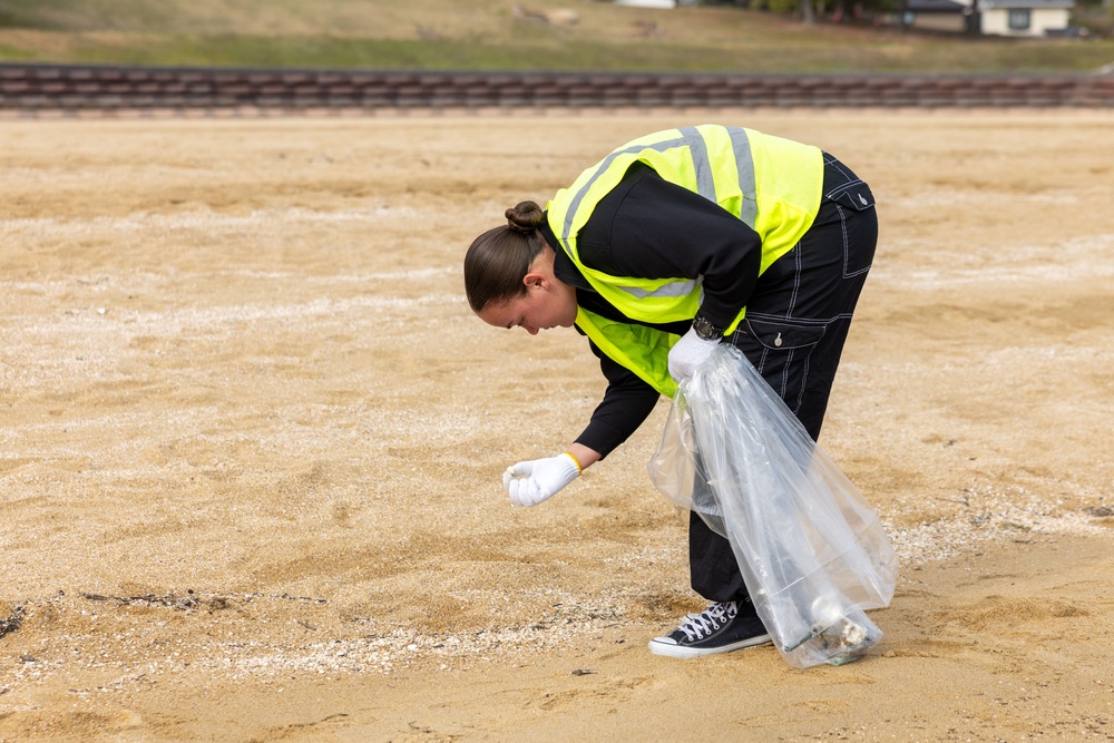 Marines and Sailors from MCAS Iwakuni participate in a beach cleanup