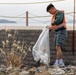 Marines and Sailors from MCAS Iwakuni participate in a beach cleanup