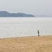 Marines and Sailors from MCAS Iwakuni participate in a beach cleanup