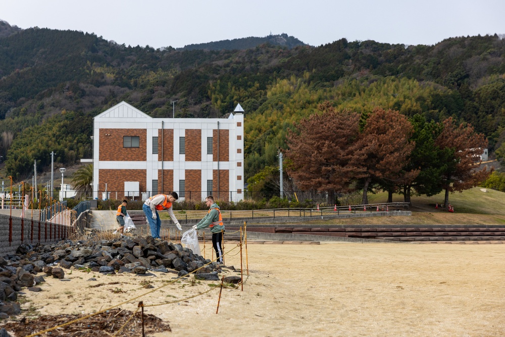 Marines and Sailors from MCAS Iwakuni participate in a beach cleanup