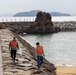 Marines and Sailors from MCAS Iwakuni participate in a beach cleanup