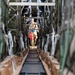 Airmen load AFCENT C-130s with humanitarian aid bound for Gaza