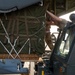 Airmen load AFCENT C-130s with humanitarian aid bound for Gaza