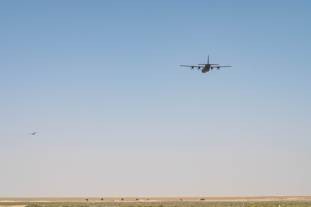 Airmen load AFCENT C-130s with humanitarian aid bound for Gaza