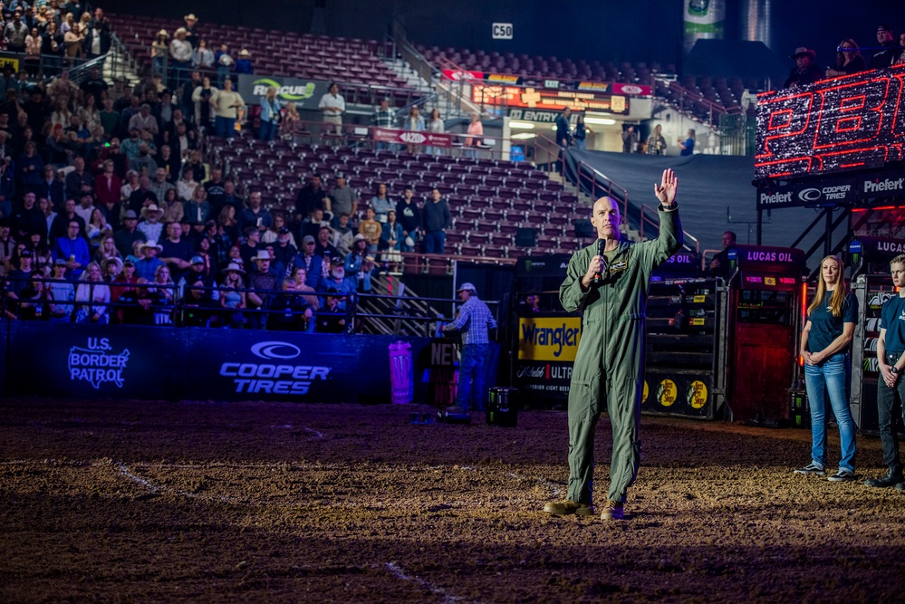 Airmen take the Oath of Enlistment during Professional Bull Riders event