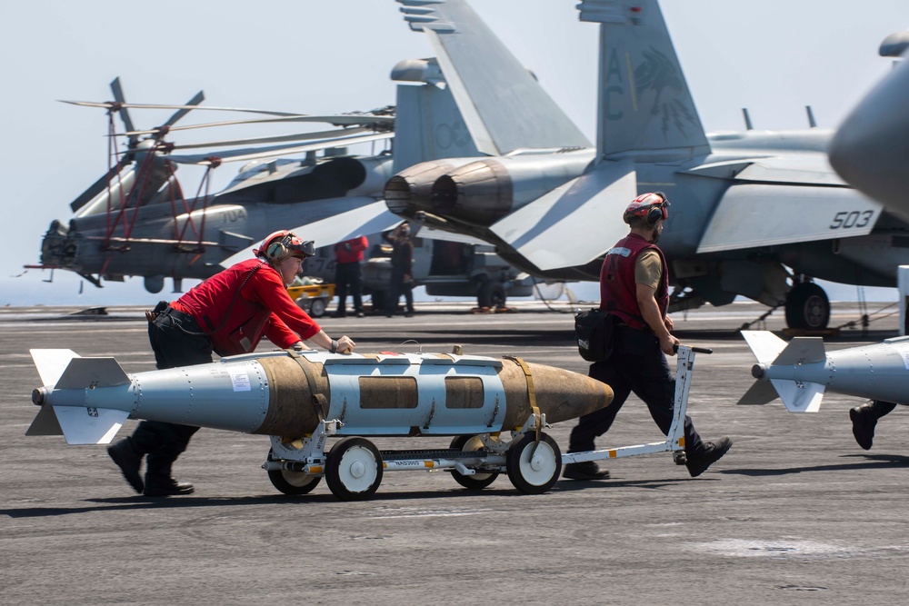 Ordnancemen Aboard the USS Dwight D. Eisenhower Prepare for Flight Operations in the Red Sea