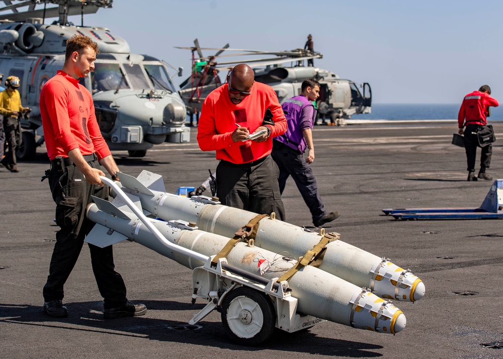 Ordnancemen Aboard the USS Dwight D. Eisenhower Prepare for Flight Operations in the Red Sea