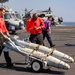 Ordnancemen Aboard the USS Dwight D. Eisenhower Prepare for Flight Operations in the Red Sea