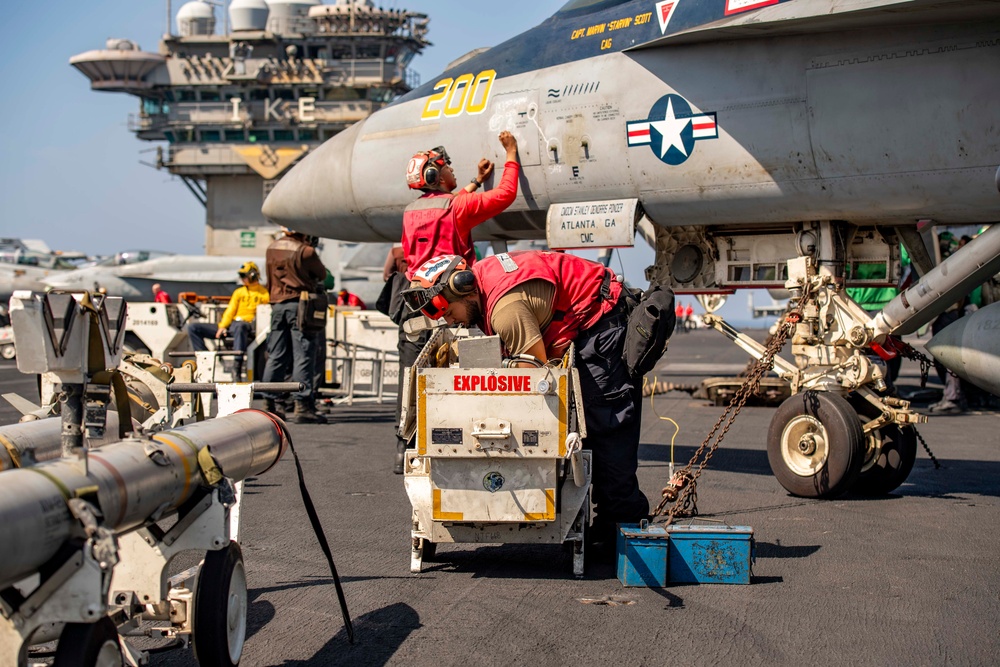 Ordnancemen Aboard the USS Dwight D. Eisenhower Prepare for Flight Operations in the Red Sea