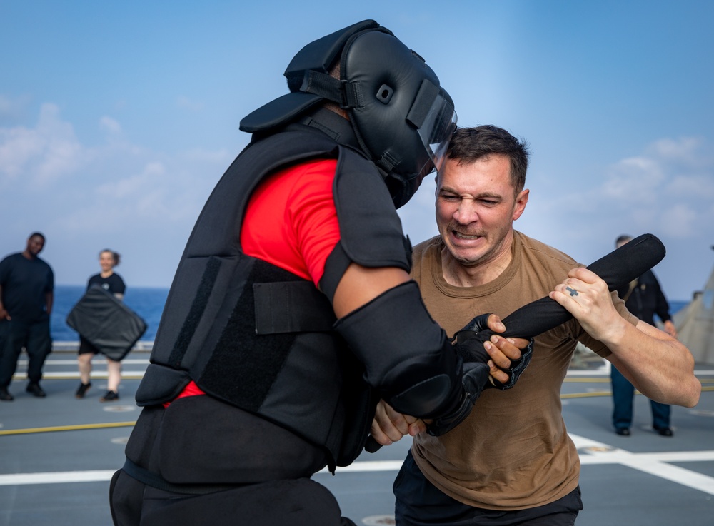 USS Mobile (LCS 26) Gold Crew sailors receive OC spray, demonstrate security force skills