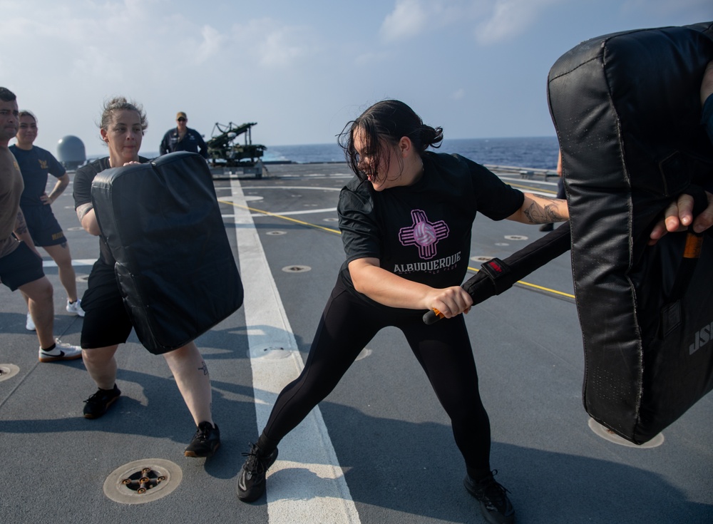 USS Mobile (LCS 26) Gold Crew sailors receive OC spray, demonstrate security force skills