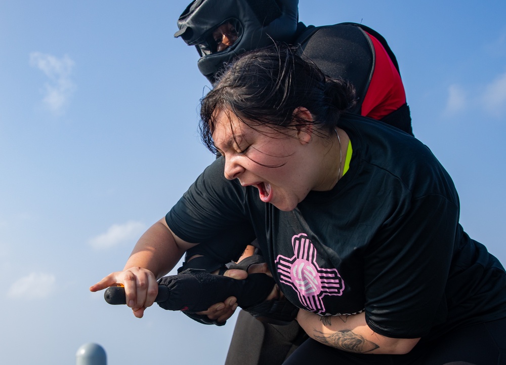 USS Mobile (LCS 26) Gold Crew sailors receive OC spray, demonstrate security force skills