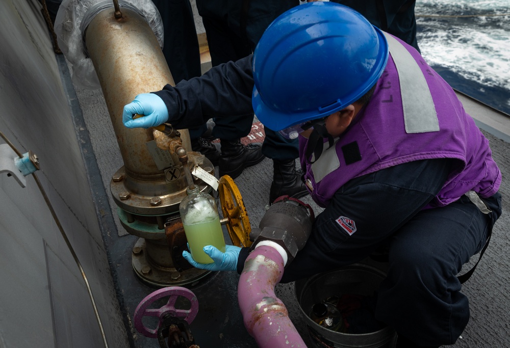 USS Mobile (LCS 26) conducts underway replenishment with USNS Wally Schirra (T-AKE 8) in South China Sea