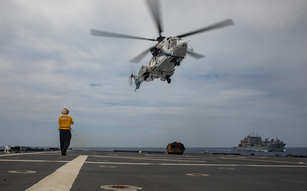 USS Mobile (LCS 26) conducts underway replenishment with USNS Wally Schirra (T-AKE 8) in South China Sea