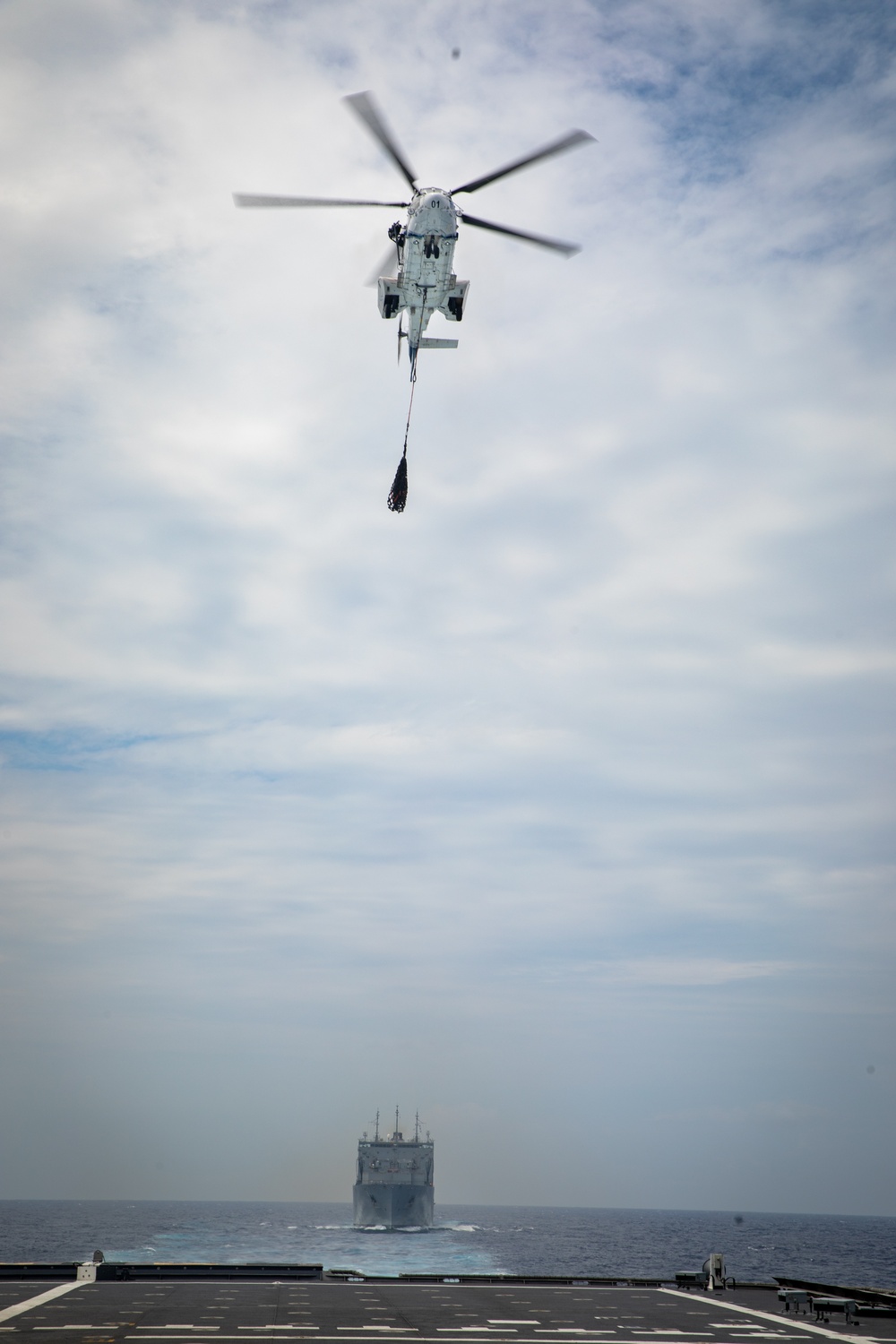 USS Mobile (LCS 26) conducts underway replenishment with USNS Wally Schirra (T-AKE 8) in South China Sea