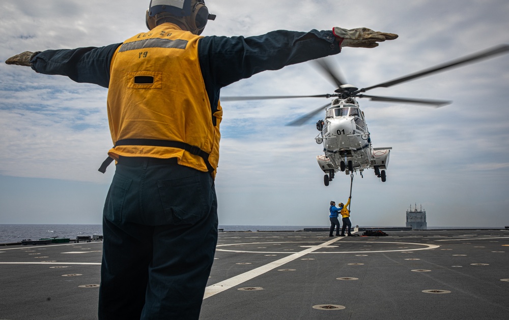 USS Mobile (LCS 26) conducts underway replenishment with USNS Wally Schirra (T-AKE 8) in South China Sea