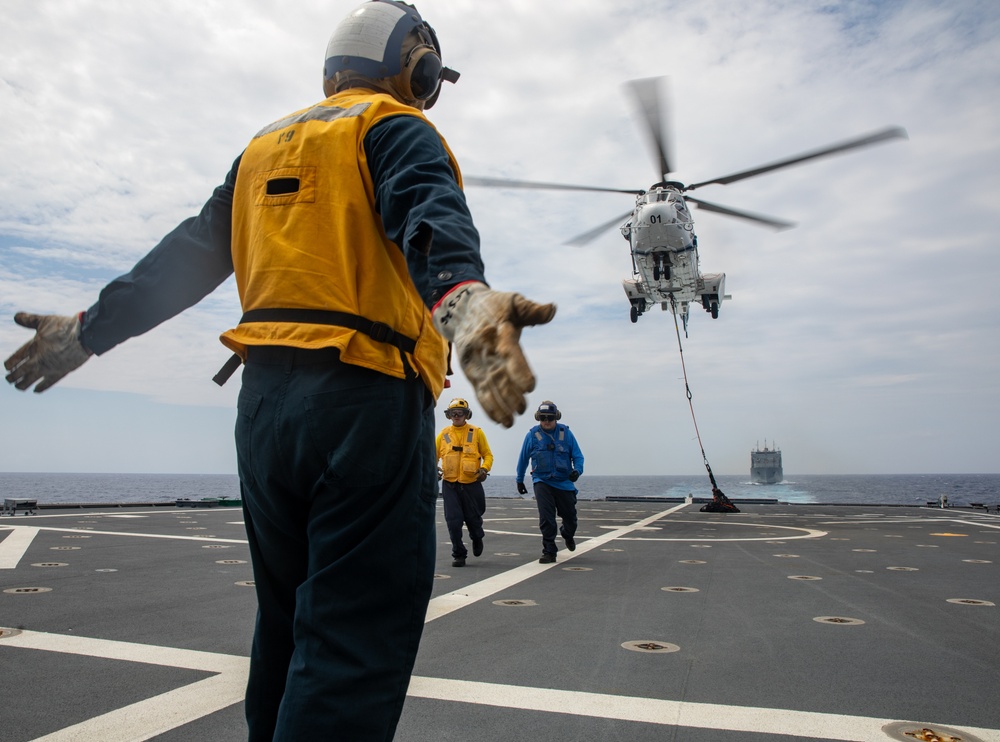 USS Mobile (LCS 26) conducts underway replenishment with USNS Wally Schirra (T-AKE 8) in South China Sea