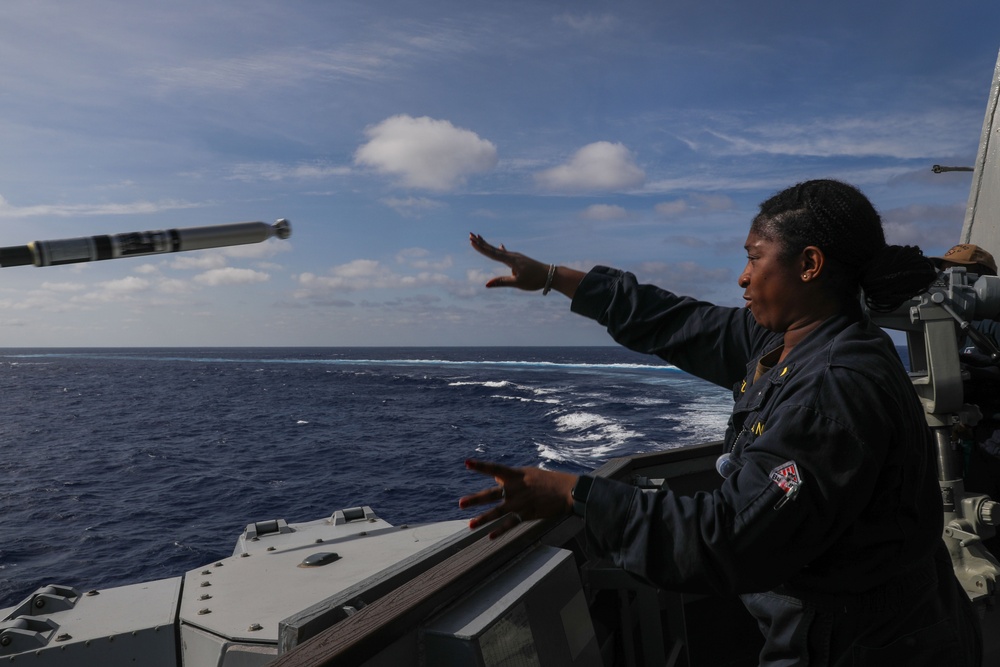 Sailors aboard the USS Howard conduct an evasive maneuver exercise in the Philippine Sea