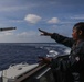 Sailors aboard the USS Howard conduct an evasive maneuver exercise in the Philippine Sea