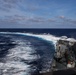 Sailors aboard the USS Howard conduct an evasive maneuver exercise in the Philippine Sea