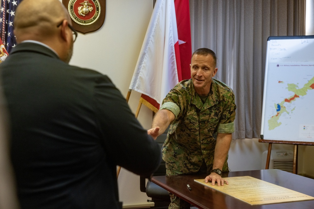 MajGen Liszewski signs the Child Abuse Prevention Month proclamation on Camp Foster