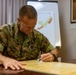 MajGen Liszewski signs the Child Abuse Prevention Month proclamation on Camp Foster