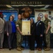 MajGen Liszewski signs the Child Abuse Prevention Month proclamation on Camp Foster
