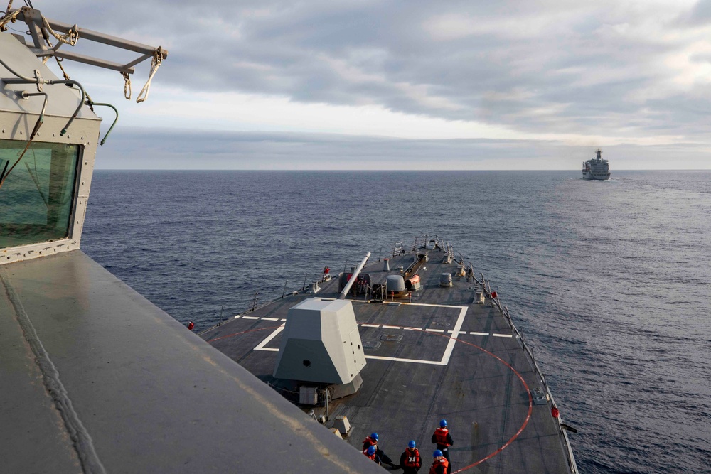 USS Ralph Johnson Conducts Replenishment-At-Sea with USNS Yukon.