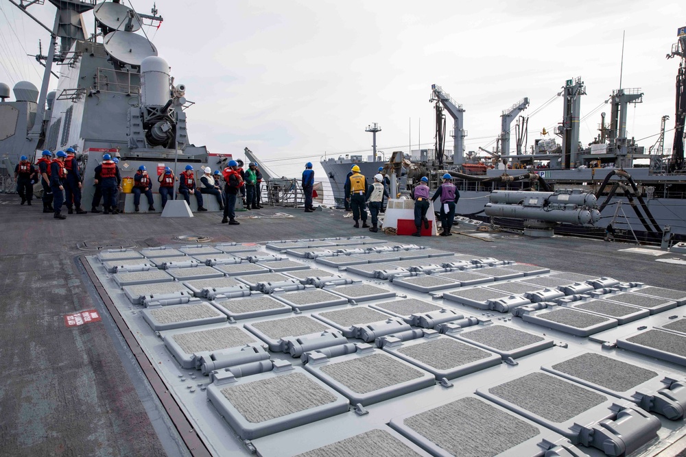 USS Ralph Johnson Conducts Replenishment-At-Sea with USNS Yukon.